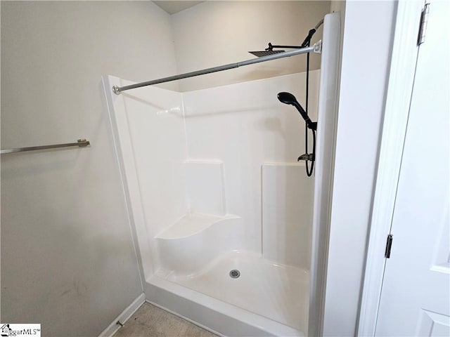 bathroom featuring a shower