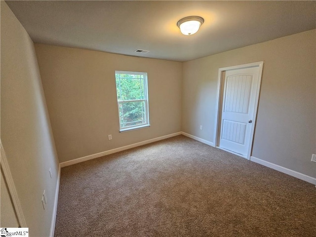 view of carpeted spare room