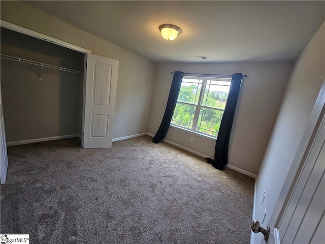 unfurnished bedroom with carpet floors