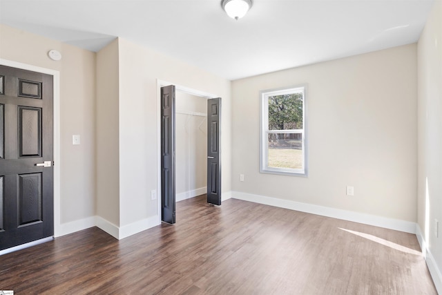 foyer featuring dark hardwood / wood-style flooring