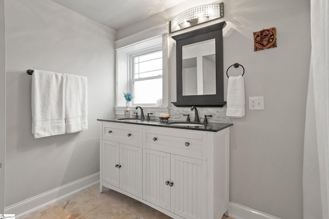 bathroom with vanity and backsplash