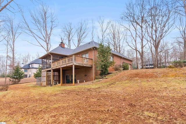 rear view of house with a deck