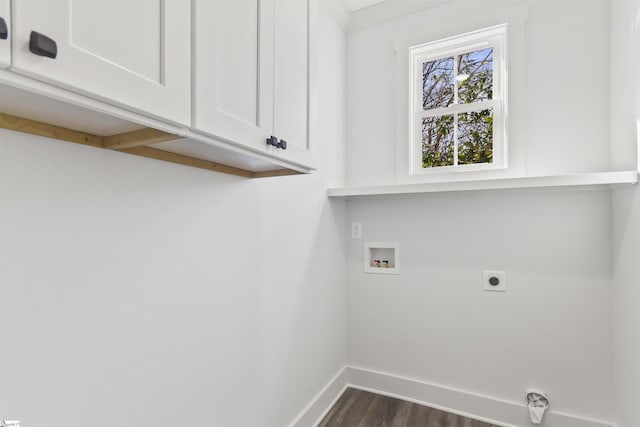 laundry area with cabinets, washer hookup, hookup for an electric dryer, and dark hardwood / wood-style flooring