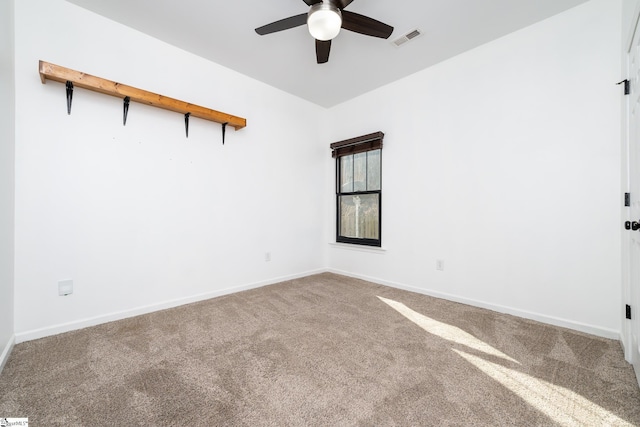 unfurnished room featuring carpet floors and ceiling fan