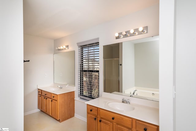 bathroom featuring vanity and plus walk in shower