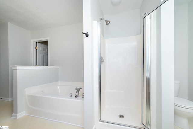 bathroom featuring toilet and shower with separate bathtub