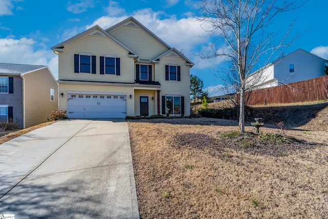 front of property featuring a garage