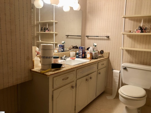 bathroom with vanity and toilet