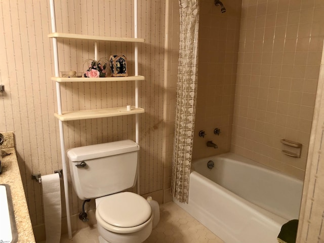 bathroom with shower / tub combo and toilet