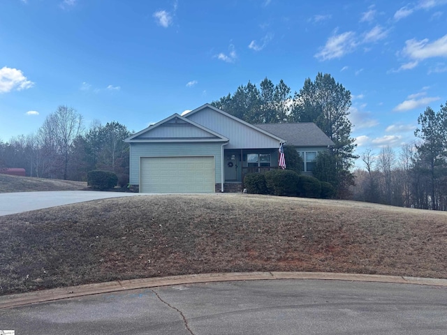 view of front of property with a garage