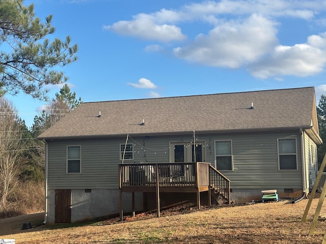 back of property featuring a deck