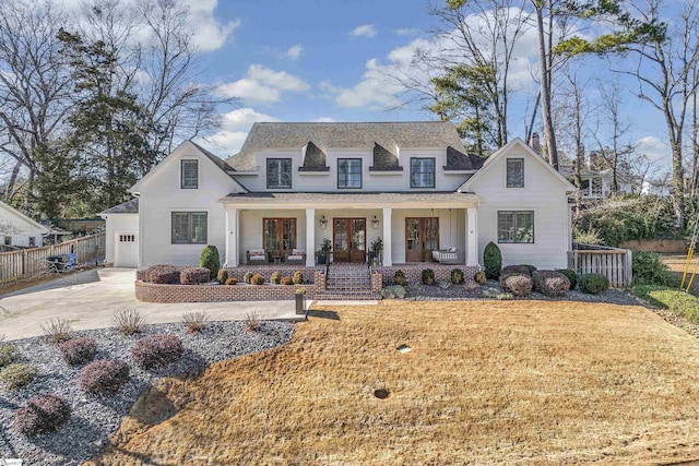 view of front of home featuring a front lawn and covered porch