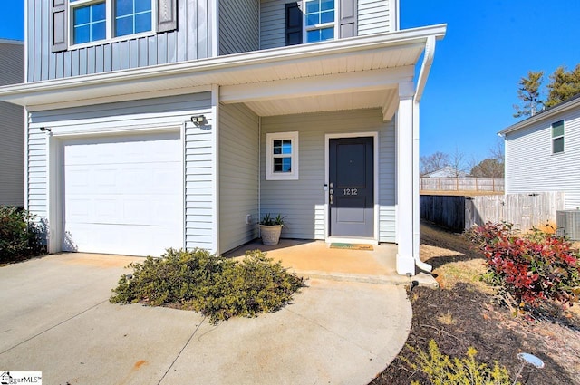 entrance to property featuring a garage