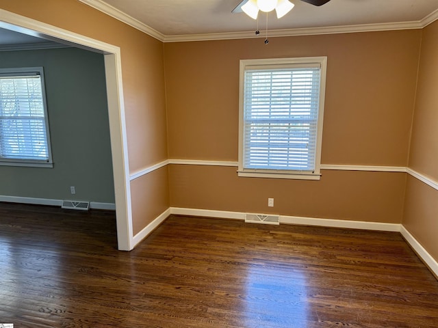 unfurnished room with dark wood-type flooring, ornamental molding, and ceiling fan