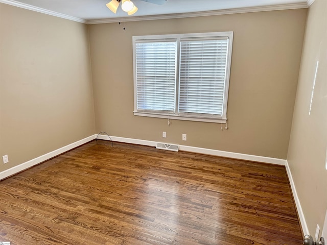 unfurnished room with ornamental molding, dark hardwood / wood-style floors, and ceiling fan