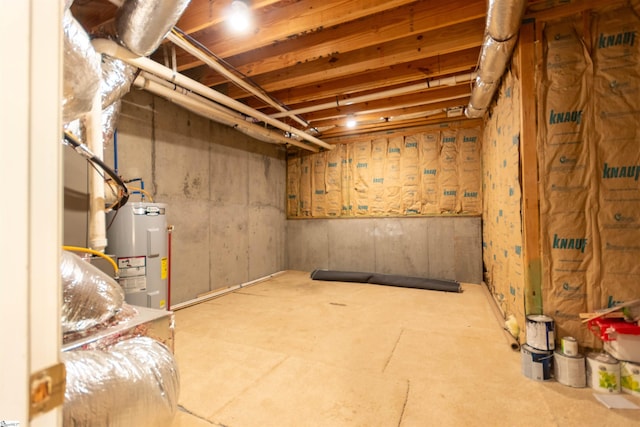 basement featuring electric water heater