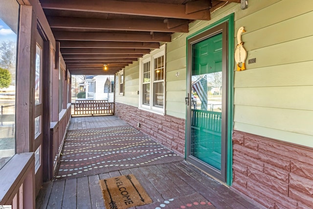 wooden terrace with covered porch