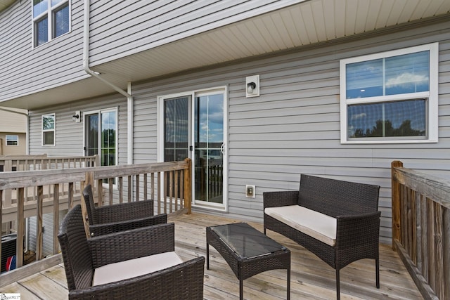 wooden deck with outdoor lounge area