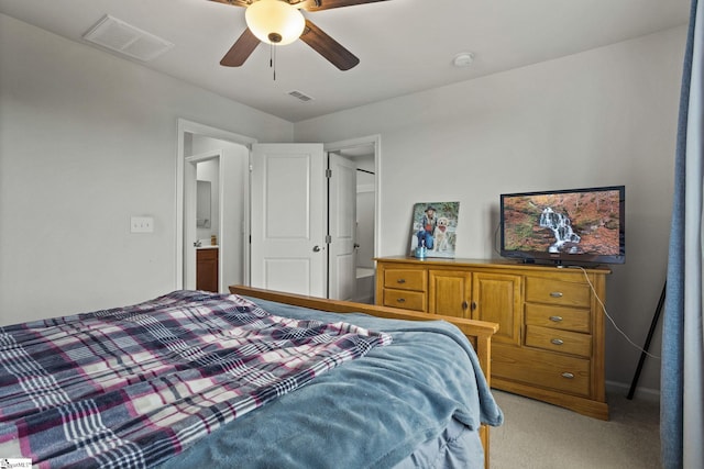 carpeted bedroom with ceiling fan