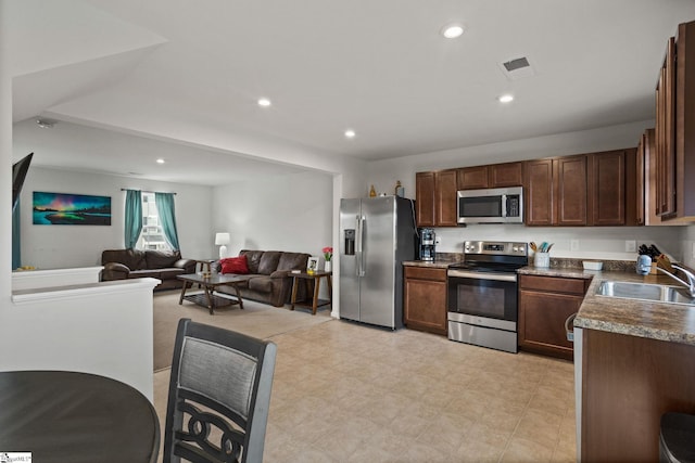 kitchen featuring sink and appliances with stainless steel finishes