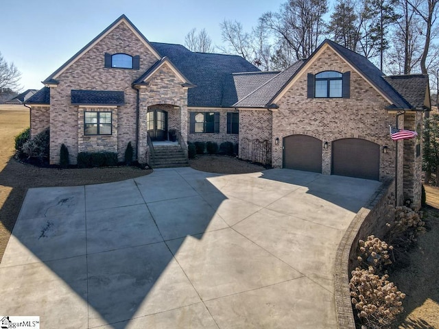 view of front of property with a garage