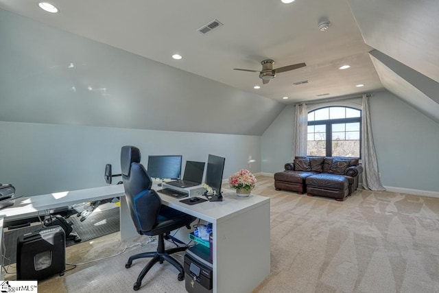 carpeted home office with vaulted ceiling and ceiling fan