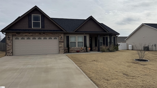 craftsman-style home featuring a front lawn