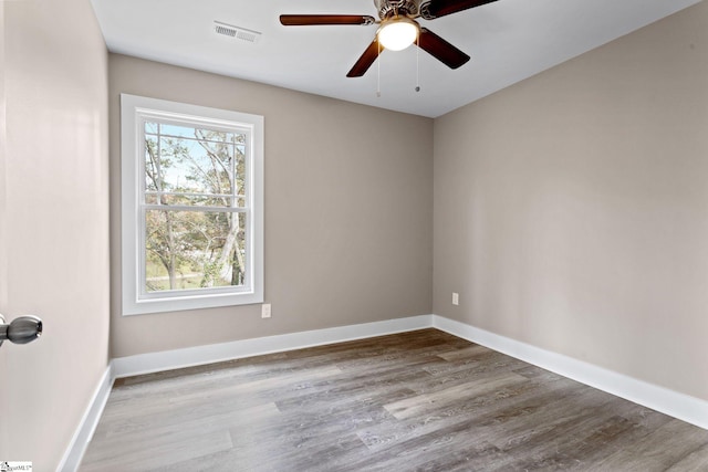 unfurnished room featuring light hardwood / wood-style flooring and ceiling fan