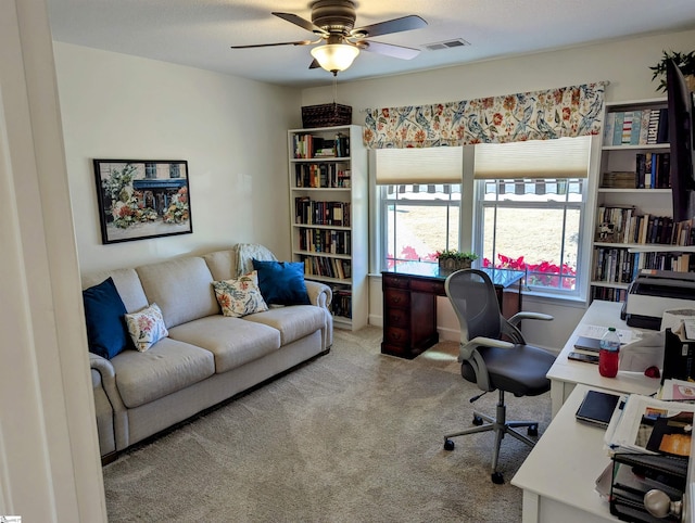 office area with ceiling fan and light colored carpet