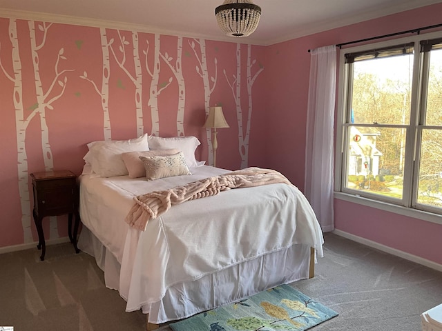 carpeted bedroom featuring multiple windows and crown molding