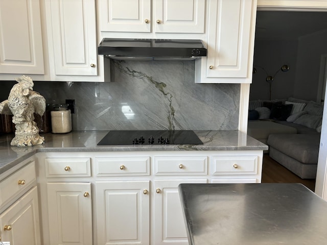 kitchen with white cabinetry, black electric stovetop, range hood, and backsplash