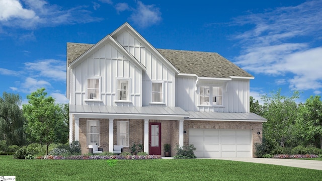 view of front facade with concrete driveway, a front lawn, board and batten siding, and brick siding