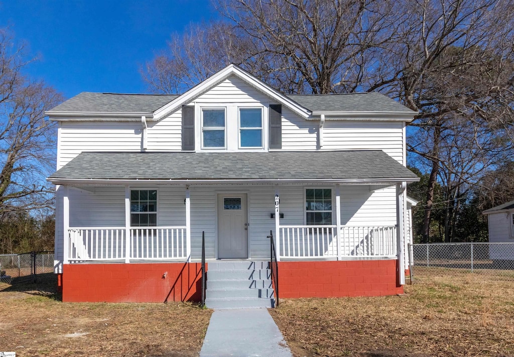 bungalow-style house featuring a porch and a front yard