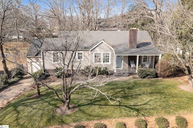 view of front of home with a porch and a front lawn