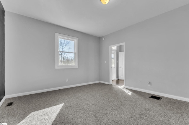 view of carpeted spare room