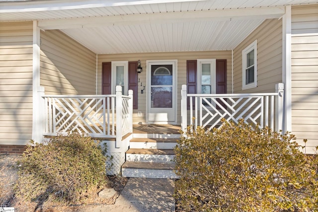 entrance to property with covered porch