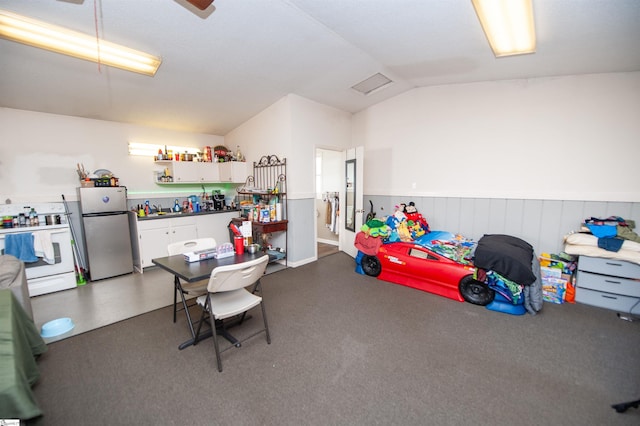 playroom with vaulted ceiling