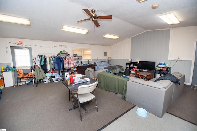 interior space featuring vaulted ceiling and ceiling fan