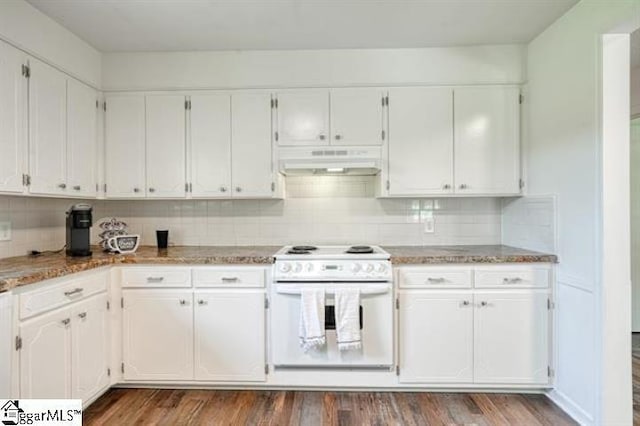 kitchen with light stone counters, dark wood-type flooring, white cabinets, and white electric range oven