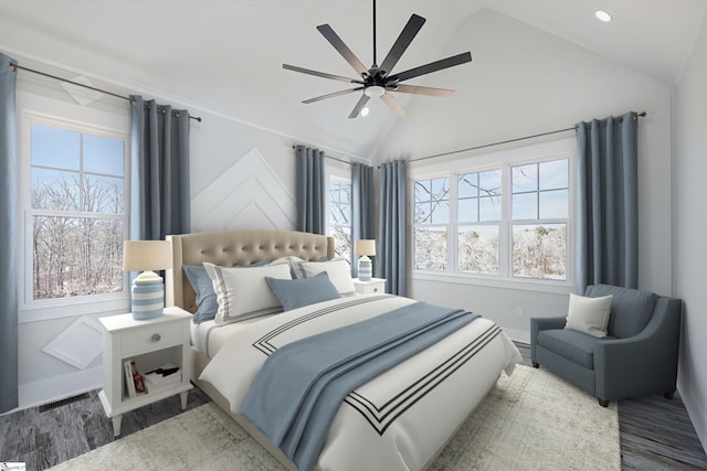 bedroom featuring vaulted ceiling, hardwood / wood-style floors, and ceiling fan