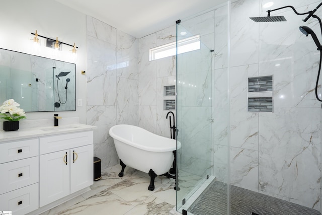 bathroom featuring vanity and independent shower and bath