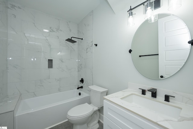 full bathroom with vanity, tiled shower / bath combo, and toilet