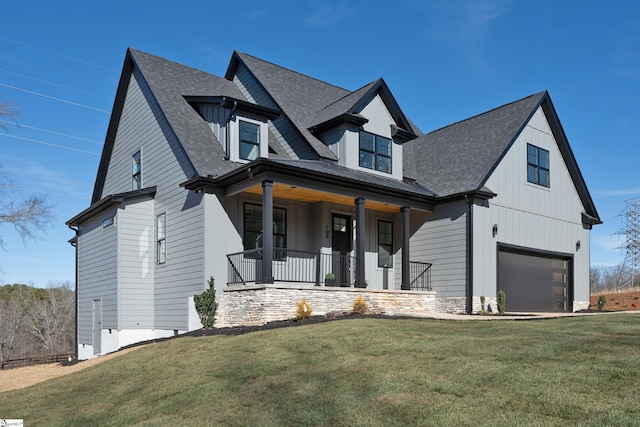 view of front facade with a front lawn and a porch