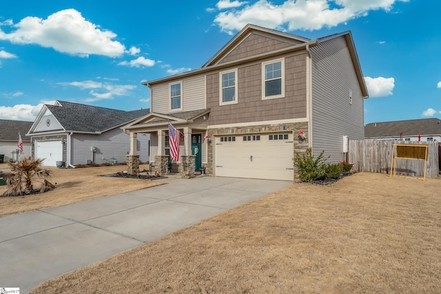 view of front of home featuring a garage and a front lawn