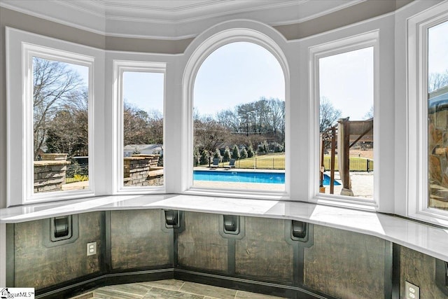 unfurnished sunroom with plenty of natural light