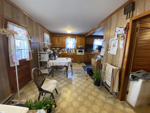 kitchen with wooden walls and white oven