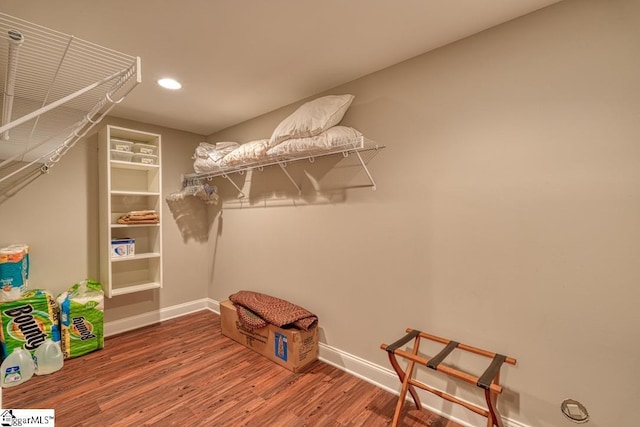 spacious closet featuring hardwood / wood-style floors