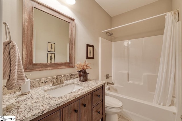 full bathroom with vanity, toilet, and shower / bath combo