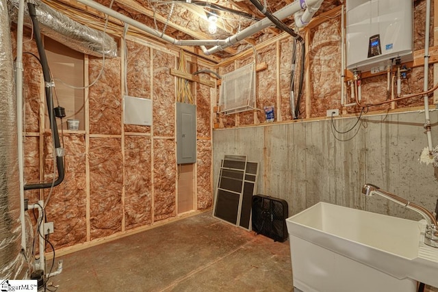 bathroom featuring electric panel, sink, and water heater