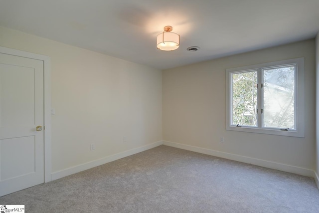 view of carpeted spare room